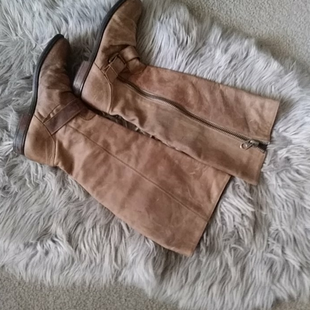 Leather tall boots motto combat.